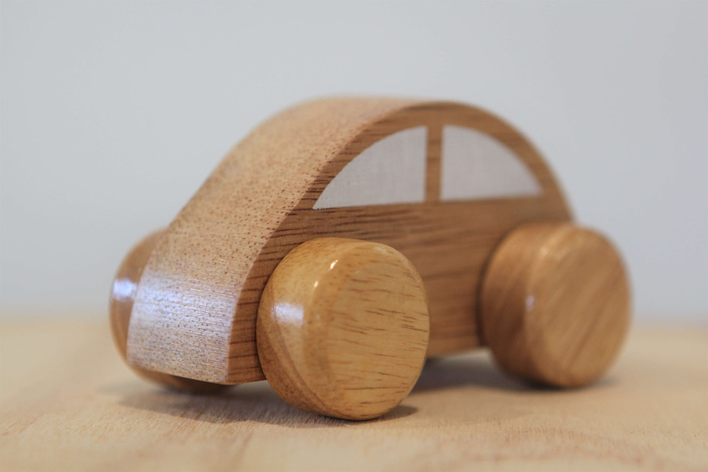 childs wooden push along car toy